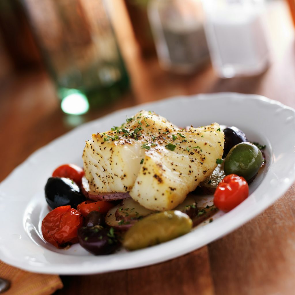 cod with olives, cherry tomatoes and potatoes
